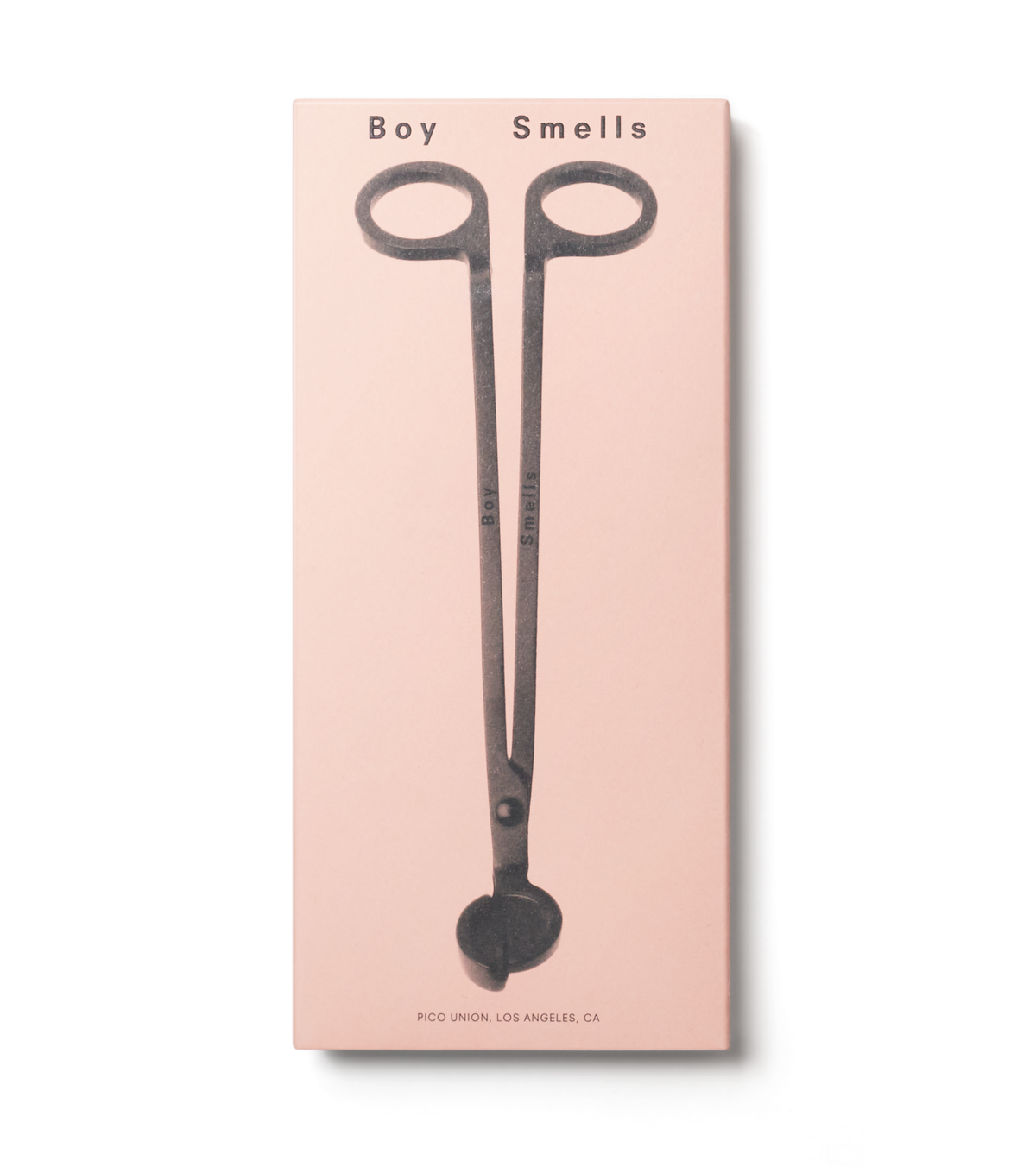 product shot of exterior pink box with black text, boy smells logo in black and black image of wick trimmer against a neutral background.